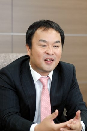 スーパーストリーム マーケティング企画部 部長 山田 誠氏。現在、スーパーストリームはキヤノン MJ ITグループの傘下にあり、グループ内の企業とも協力している